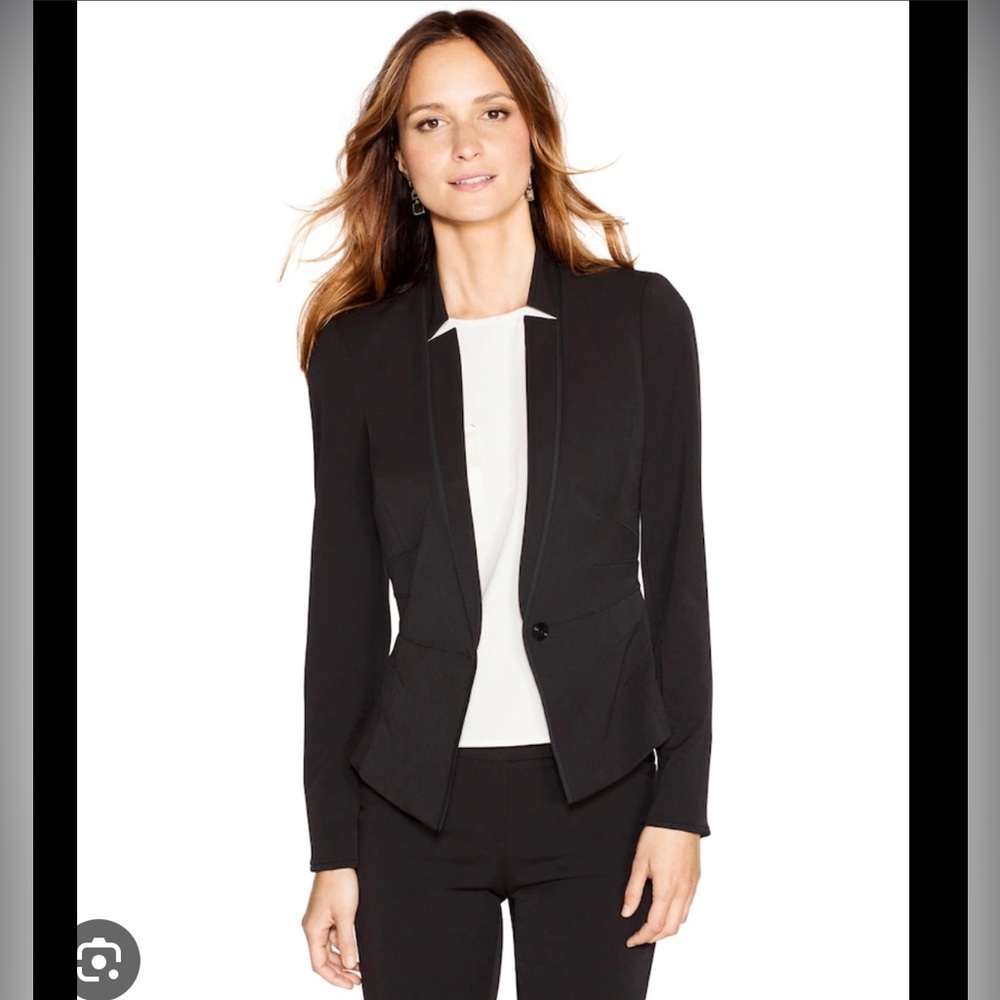 Classic collarless black blazer.